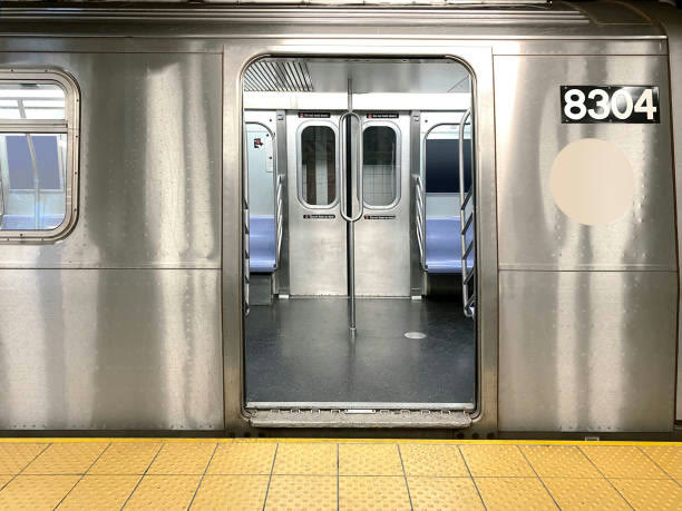 Subway car doors open at a platform
